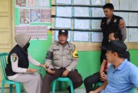 Personel pengamanan PPK Kecamatan Kota Agung Timur saat diperiksa Sidokkes Polres Tanggamus, Jumat 16 Februari 2024. Foto : Dok. Polres Tanggamus.