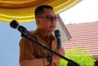 Sekretaris Dinas (Sekdis) Pendidikan Kabupaten Tanggamus Adi Gunawan saat membuka festival FLS2N di SDN 4 Kuripan, Selasa, 20 Februari 2024. Foto : Diki/Media Prioritastv.com.

