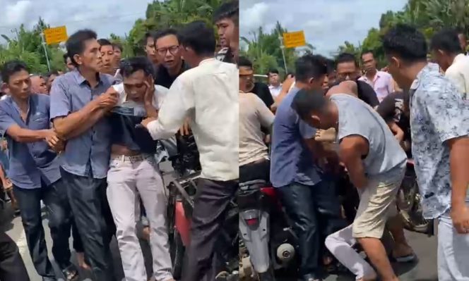 
 Pelaku yang berhasil ditangkap dan diamuk massa di Pekon Teba, Kota Agung Timur Tanggamus, Kamis 11 April 2024. Foto : Tangkapan Layar Video.