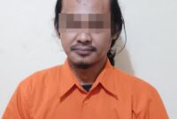 AL Warga Ambarawa Pringsewu Tersangka Penggelapan Mobil saat Ditahan di Polsek Pringsewu. Foto : Polsek Pringsewu 