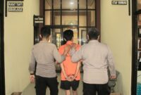 Tersangka MS saat Dijebloskan ke Sel Tahahan, Selasa 14 Mei 2024. Foto : Humas Polres Pringsewu.
