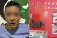 NG Bandar Sabu Berikut Barang Bukti Sabu, Timbangan Digital dan Uang Tunai saat Diamankan di Polres Pringsewu. Foto : Humas Polres Pringsewu 