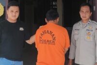 Tersangka SSR saat diamankan di Polsek Gunung Sugih, Minggu 14 Juli 2024. Foto : Polres Lampung Tengah.