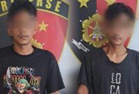 Kedua tersangka saat diamankan di Polsek Panjang, Sabtu 20 Juli 2024. Foto : Polresta Bandar Lampung.