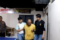 Tersangka saat diamankan Polsek Gading Rejo, Jumat 26 Juli 2024.
