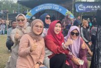 Ketua KONI Tanggamus, Dewi Handajani saat menghadiri final turnamen sepak bola Margodadi Cup III, Minggu 28 Juli 2024. | Foto : Mustar Arifin/Media Prioritastv.com.