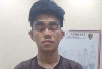Tersangka FDI saat Diamankan di Polres Lampung Tengah.