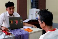 Tersangka AS saat diperiksa pihak kepolisian, Jumat 23 Agustus 2024 | Dok. Polres Pringsewu.