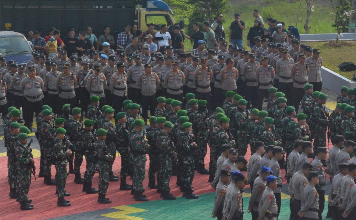 Ratusan personil saat apel gelar pasukan di Bendungan Marga Tiga, Lampung Timur, Minggu 25 Agustus 2024.