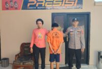Tersangka saat diamankan di Polsek Gading Rejo, Senin 26 Agustus 2024.