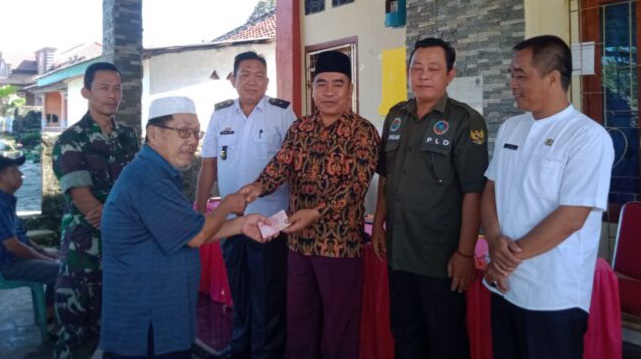 Penyerahan BLT-DD Pekon Teba, Kota Agung Timur, Tanggamus, Rabu 15 Mei 2024.