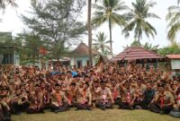 Pj Gubernur Lampung Samsudin saat menyapa para Pramuka usai apel besar, Minggu 1 September 2024.