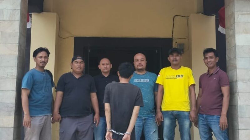 Tersangka RS usai ditangkap tim gabungan Polres Tanggamus, Minggu 1 September 2024.
