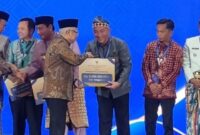 Pj Bupati Tanggamus Mulyadi Irsan saat menerima dana fiskal penurunan stunting di Jakarta, Rabu 4 Agustus 2024.