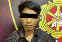 Tersangka saat KM setelah ditangkap Polres Metro, Lampung.