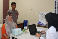 Tersangka HH saat dimintai keterangan unit PPA Satreskrim Polres Pringsewu, Rabu 18 September 2024.