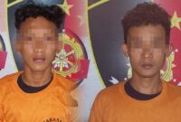 Kedua tersangka saat ditahan di Mapolsek Panjang Bandar Lampung.