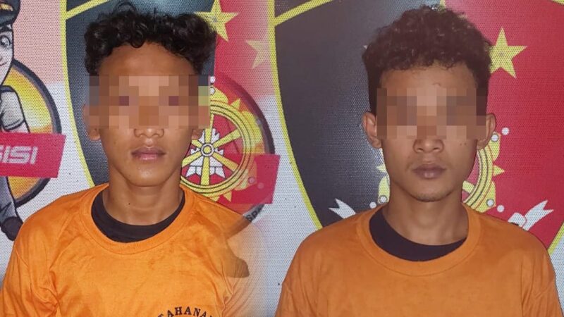 Kedua tersangka saat ditahan di Mapolsek Panjang Bandar Lampung.