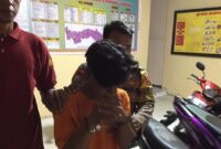 Tersangka DI saat digiring ke sel tahanan Polresta Bandar Lampung, Sabtu 28 September 2024.