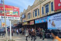 Pengamanan Kunjungan Pj Gubernur Lampung di Pasar Gading Rejo, Pringsewu, Kamis 3 Oktober 2024.