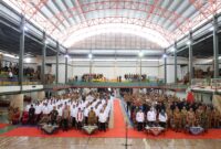 Caption: Suasana Pelantikan DPC Apdesi Lampung Barat masa bakti 2024-2028 di GOR Ajisaka Kawasan Sekuting Terpadu, Pekon Watas, Kecamatan Balik Bukit, Lampung Barat pada Senin (30/9/2024), lalu.