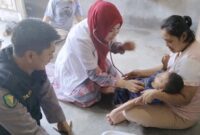 Pemeriksaan Kesehatan Rafan Gifari (4) Pasien Celbral Palsy di wilayah Way Kamal, Negeri Ratu, Kotaagung, kemarin, Sabtu 19 Oktober 2024.