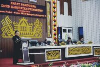 Pj Bupati Pringsewu saat menyampaikan pemandangan fraksi-fraksi DPRD setempat, Selasa 29 Oktober 2024.