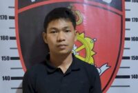 Tersangka Rio saat diamankan di Polres Metro, Lampung.