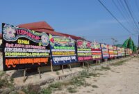 Karangan bunga para Kepala Pekon di Mapolres Pringsewu.