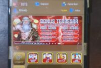 Barang bukti handphone berisi link aplikasi Judi Online milik tersangka.