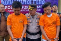 Kedua tersangka saat berada di Polsek Sukarame Bandar Lampung.