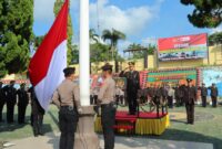 Wakapolres Tanggamus Kompol Made Silpa Yudiawan saat memimpin upacara Hari Pahlawan ke 79 di Polres setempat, Minggu 10 November 2024.