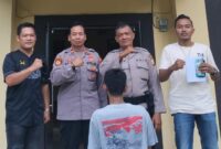 Pelaku saat diamankan di Polsek Wonosobo Tanggamus.
