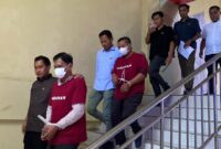 Kedua Tersangka saat digiring ke Sel Tahananan Polda Lampung.