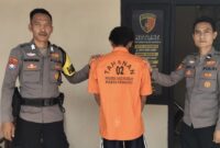 Tersangka RP sebelum dijebloskan ke sel tahanan Polsek Gading Rejo, Pringsewu, Sabtu 21 Desember 2024 | Dok. Humas Polres Pringsewu.