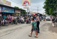 Petugas pengamanan Polda Lampung hadir di Pasar Way Kandis, Minggu 22 Desember 2024 | Dok. Humas Polda Lampung.