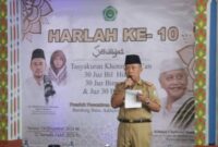 Staf Ahli Bidang Pemerintahan, Hukum, dan Politik Kabupaten Pringsewu, Hipni saat membacakan amanat Pj Bupati Pringsewu.