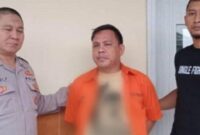 Tersangka RF sebelum dijebloskan ke Sel Tahanana Polsek Pringsewu Kota, Selasa 24 Desember 2024 | Dok. Humas Polres Pringsewu.