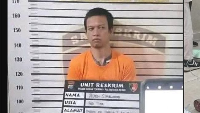 Pelaku Rudi Sihombing setelah diamankan pihak kepolisian.