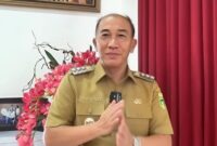 Pj Bupati Tanggamus Mulyadi Irsan saat Mengucapkan Selamat Tahun Baru 2025 | Dok. Instagram Kominfo Tanggamus.