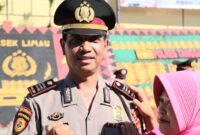 Kapolsek Semaka AKP Sutarto setelah pemasangan pangkat oleh sang istri, Kamis 2 Januari 2024 | Dok. AKP Sutarto.