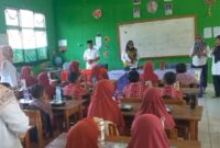 Pembagian Makan Bergizi Gratis DPD Gibran Center Tanggamus di SDN 1 Banjar Agung Ilir, Kecamatan Pugung, Rabu 15 Januari 2025.