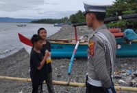 Patroli Tempat Wisata Sat Lantas Polres Tanggamus di Pantai Muara Indah, Kota Agung, Senin 27 Januari 2025 | Dok. Humas Polres Tanggamus.