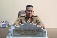 Kadis Kesehatan Tanggamus Taufik Hidayat saat memberikan keterangan di ruang kerjanya, Senin 13 Januari 2025 | Herdi/Media Prioritastv.com.