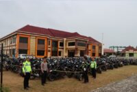Anggota Polres Pringsewu saat melakukan pendataan kendaraan yang berhasil disiti, Minggu 2 Februari 2025 | Dok. Polres Pringsewu.