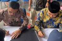 Bupati dan Wakil Bupati Tanggamus, Hi. Moh Saleh Asnawi - Aguas Suranto saat melakukan registrasi, Minggu 16 Februari 2025.