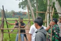 Pembongkaran Portal TPS3R di Pardasuka Pringsewu oleh tim gabungan, Rabu 26 Februari 2025.