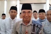 Bupati Tanggamus Hi. Moh. Saleh Asnawi saat mengucapkan selamat Idul Fitri kepada masyarakat Tanggamus di Masjid Nurul Faidzin, Islamic Center, Kota Agung, Senin 31 Maret 2025  | Herdi/Media Prioritastv.com.