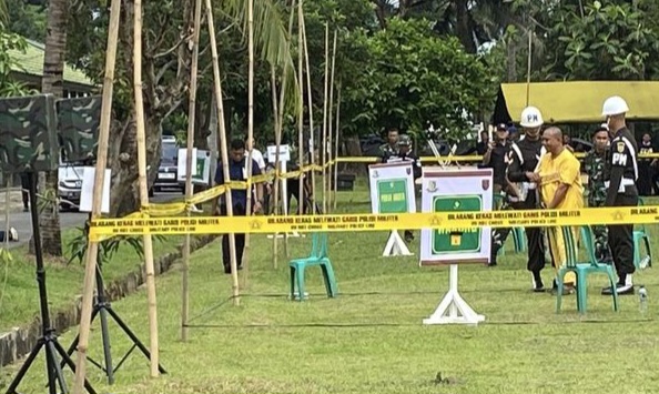 Tersangka Kopda Basarsyah saat dihadirkan dalam rekonstruksi kasus penembakan 3 Polisi di Way Kanan, yang digelar di Lapangan Satlog Korem 043 Garuda Hitam, Way Halim, Bandar Lampung, Kamis 17 April 2025.