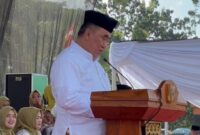 Bupati Tanggamus, Moh. Saleh Asnawi saat memberikan sambutan dalam Tabligh Akbar dan Halal Bihalal di Halaman Masjid Nurul Faidzin Islamic Center, Kota Agung, Sabtu 26 April 2025 | Herdi/Media Prioritastv.com.